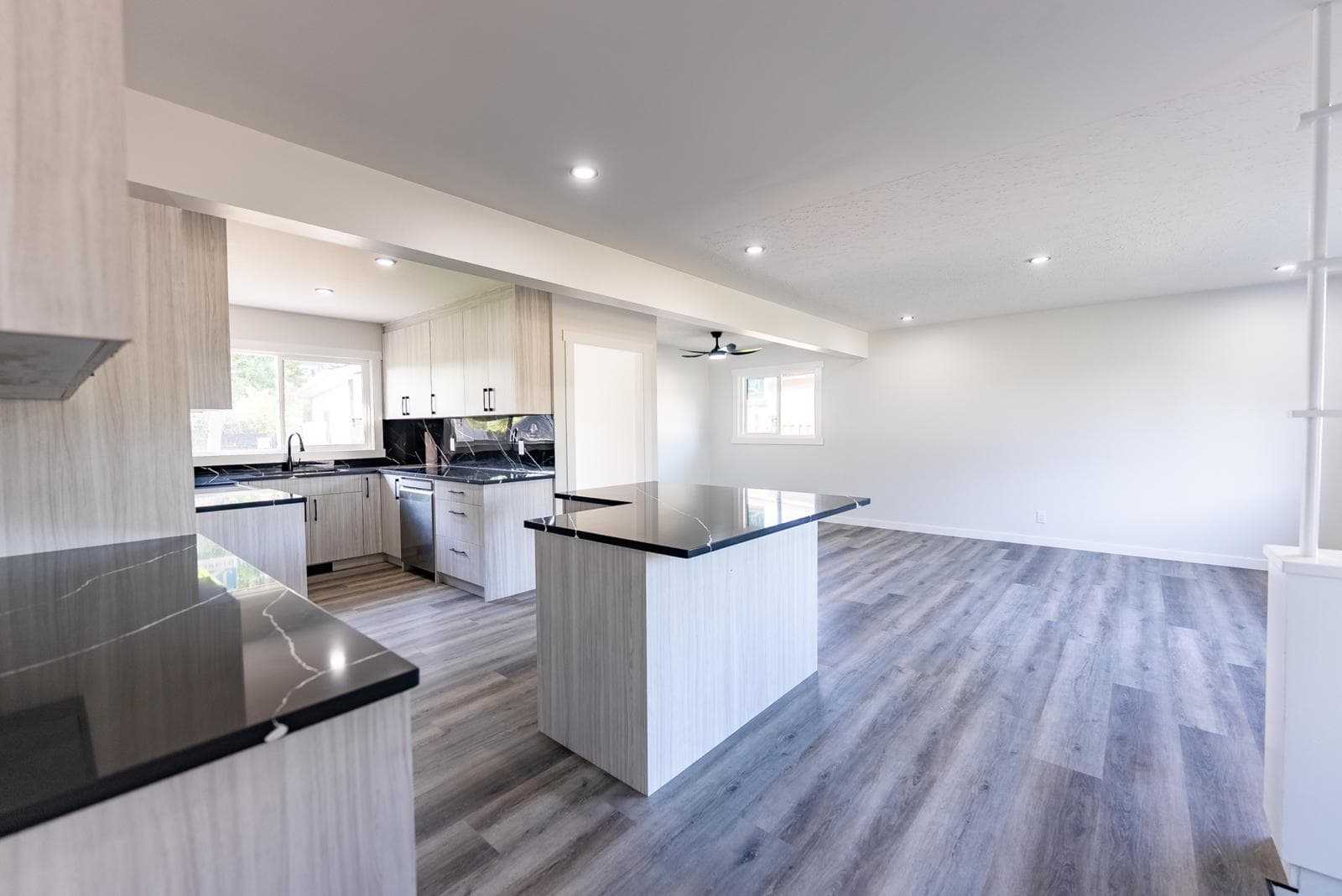 Open-concept renovated home interior — JFK Surfaces full home renovation in Central Alberta