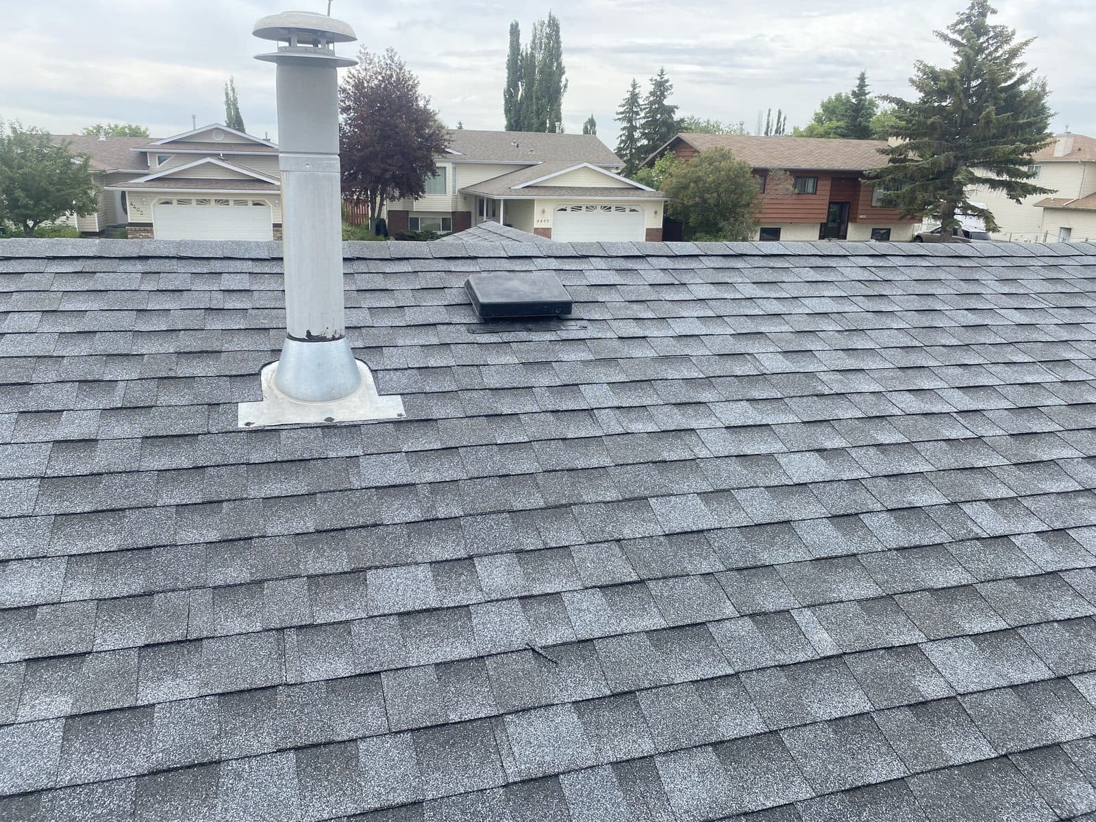 Vent stack flashing collar — JFK Surfaces project in Central Alberta